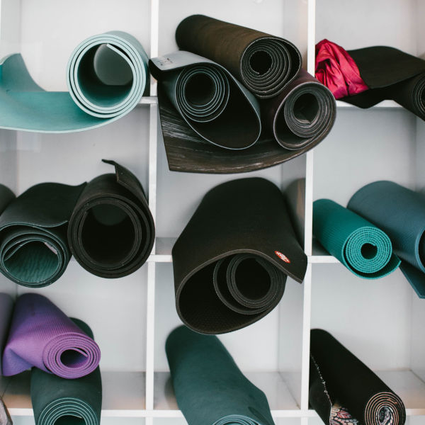 Yoga mats rolled up.